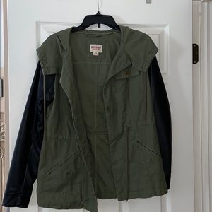 Army green jacket with black leather sleeves